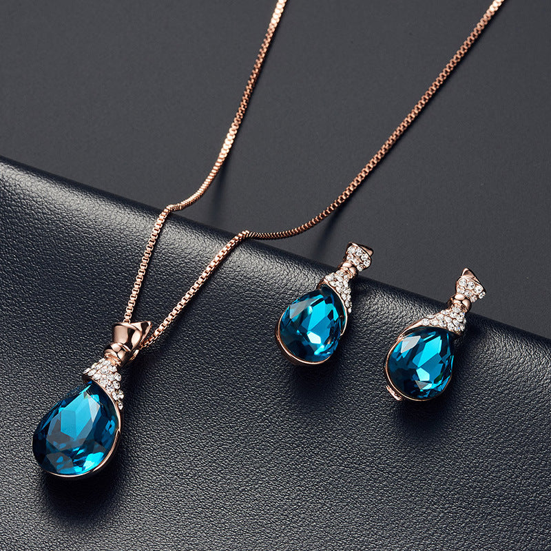 Enchanté Brilliance: Rhinestone Elegance Necklace Earrings Set